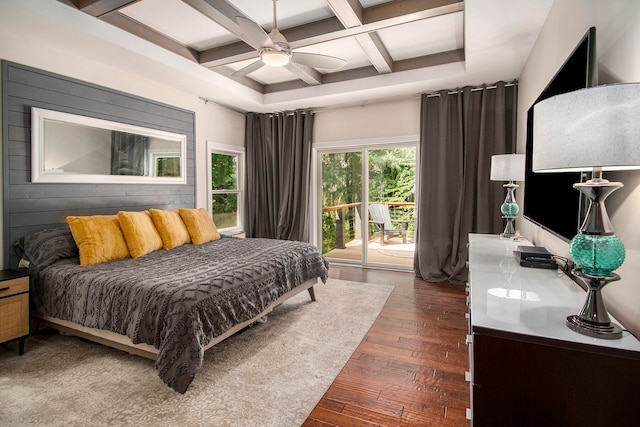 bedroom with access to outside, coffered ceiling, ceiling fan, beamed ceiling, and dark hardwood / wood-style flooring