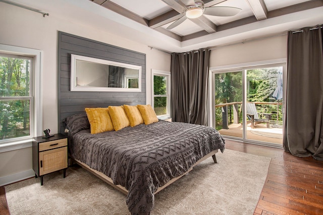 bedroom featuring access to exterior, ceiling fan, coffered ceiling, beamed ceiling, and hardwood / wood-style floors