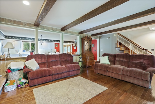 living room with wood-type flooring and beam ceiling