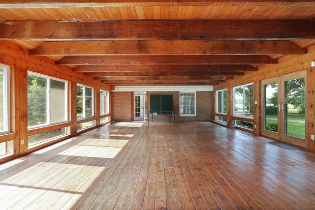 4705 Weiss Rd, Frankenmuth, MI 48734 - unfurnished sunroom with french doors, hardwood / wood-style floors, beam ceiling, and a wooden deck