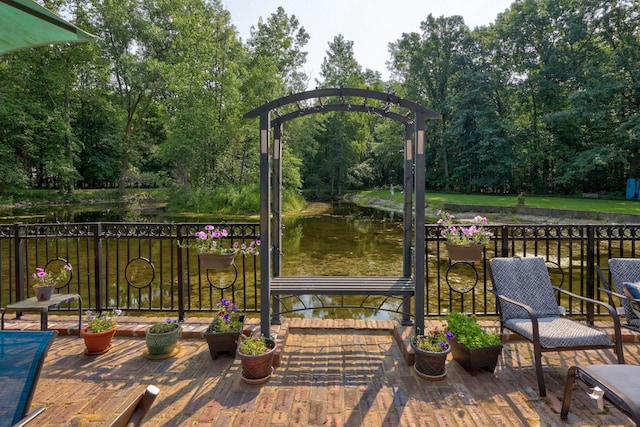 4705 Weiss Rd, Frankenmuth, MI 48734 - deck featuring view of scattered trees and a water view