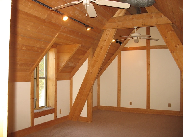 bonus room with vaulted ceiling and ceiling fan