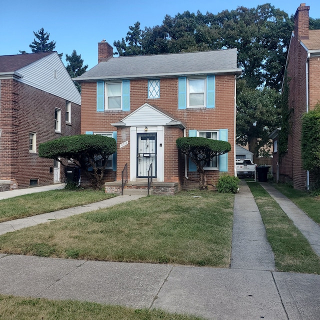 view of front of house with a front lawn