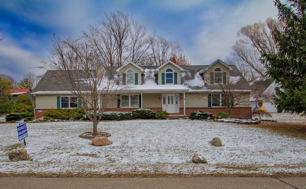 view of new england style home