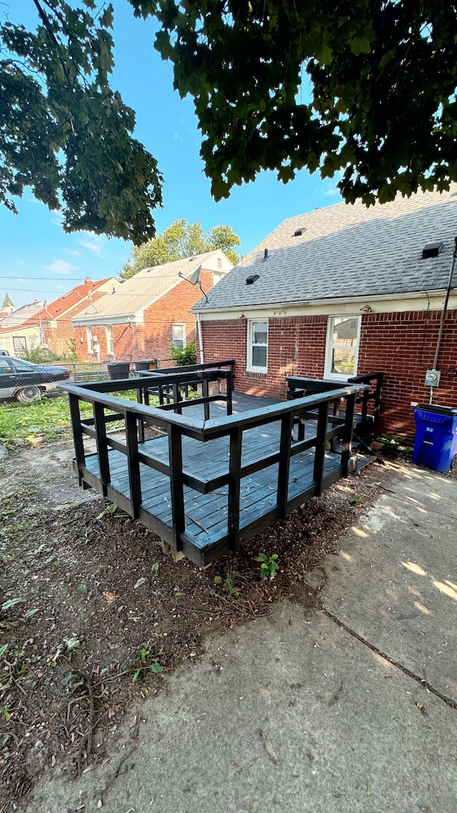 exterior space featuring a wooden deck