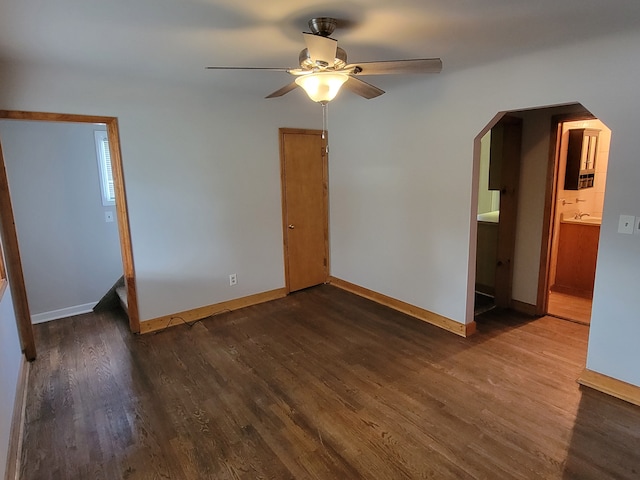 spare room with ceiling fan and hardwood / wood-style floors