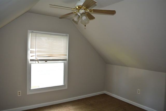 bonus room with ceiling fan, plenty of natural light, carpet, and vaulted ceiling