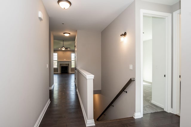 hallway with dark hardwood / wood-style floors