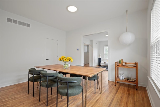 dining room featuring light hardwood / wood-style floors