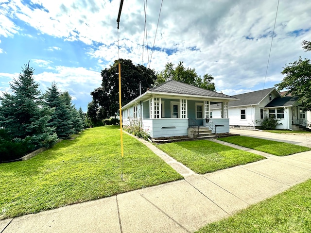 view of front of house featuring a porch and a front lawn