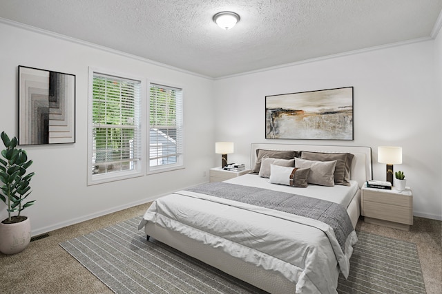 bedroom featuring carpet, ornamental molding, and a textured ceiling