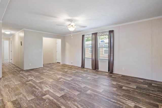 spare room with crown molding, hardwood / wood-style floors, and ceiling fan