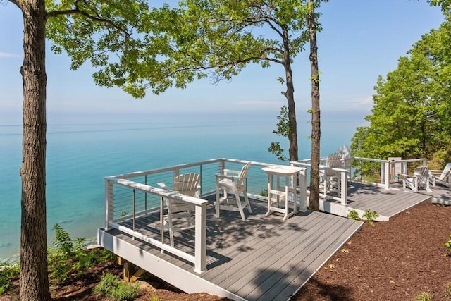 deck featuring a water view