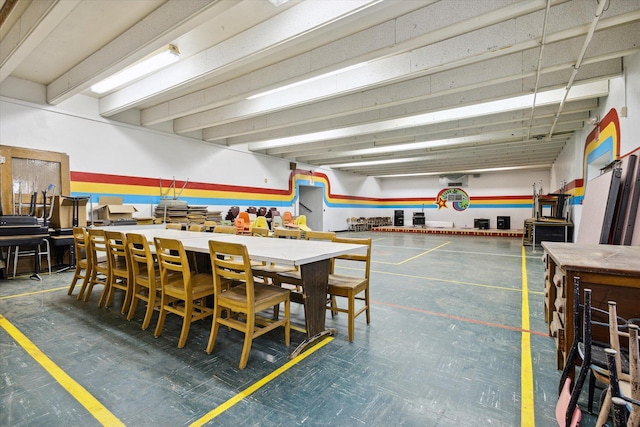 dining area with beamed ceiling