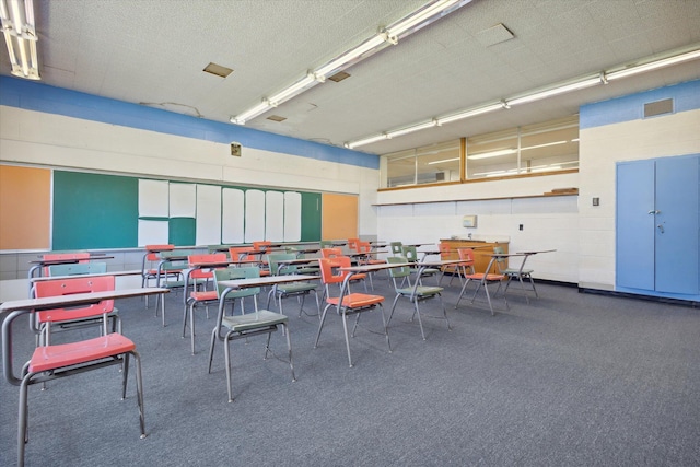 interior space featuring a textured ceiling