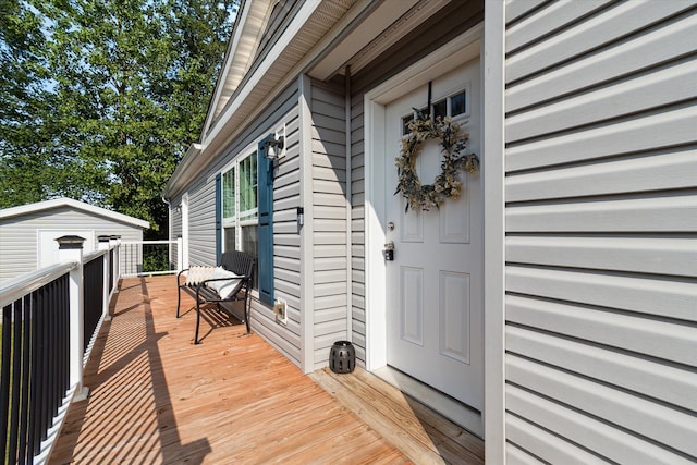 deck with a storage shed