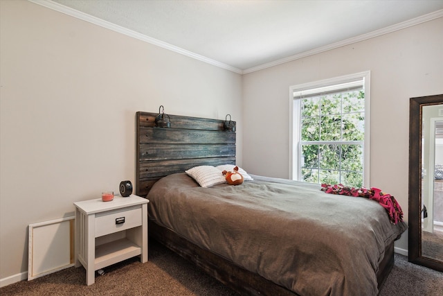 bedroom featuring dark colored carpet and crown molding