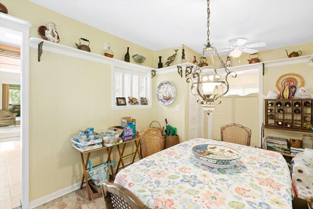 7400 Aspen Rd, Lexington, MI 48450 - dining room featuring ceiling fan and baseboards