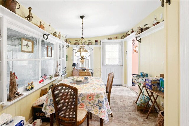 7400 Aspen Rd, Lexington, MI 48450 - dining area with light stone finish floors