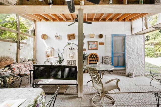 view of patio featuring ceiling fan