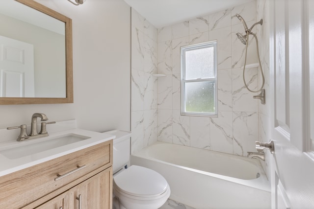 full bathroom with vanity, toilet, and tiled shower / bath combo