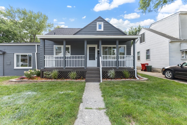 view of front of property featuring a porch and a front yard