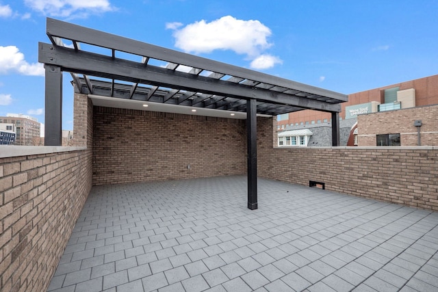 view of patio featuring a pergola