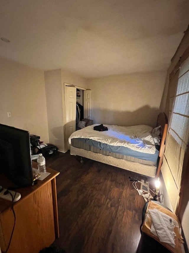 bedroom featuring hardwood / wood-style flooring