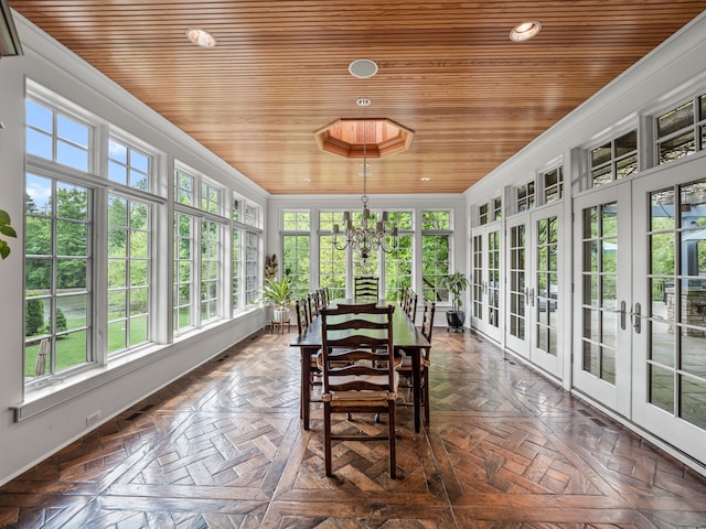 sunroom with wood ceiling and french doors