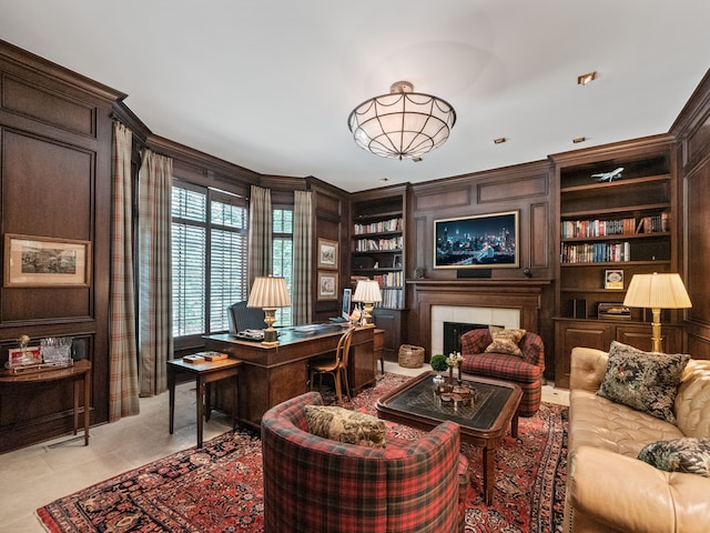 office area with built in features and light tile patterned floors