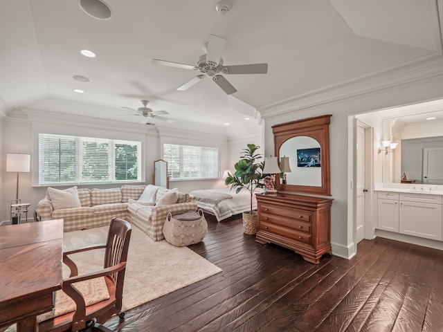 living room with sink, ceiling fan with notable chandelier, dark hardwood / wood-style floors, and ornamental molding