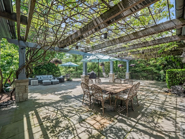 view of patio featuring outdoor lounge area and a pergola