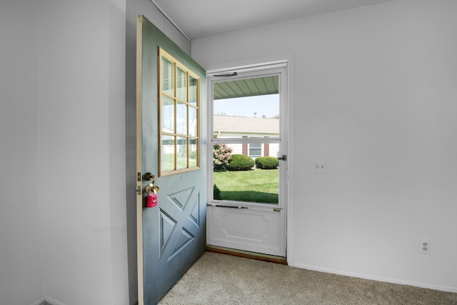 entryway with light carpet