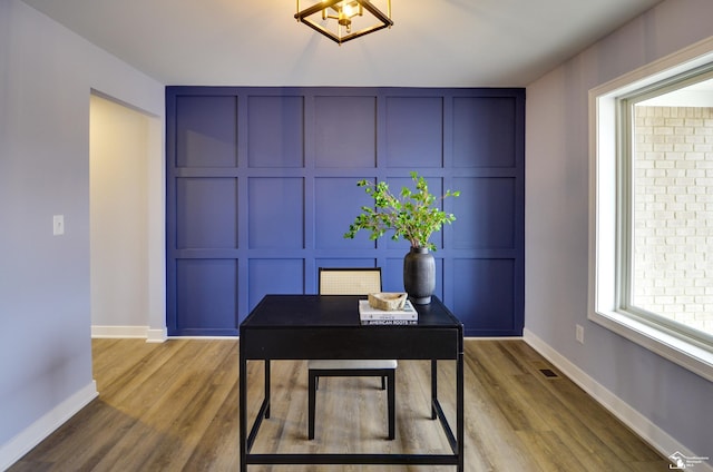 office area with wood-type flooring