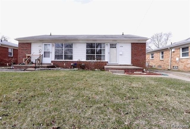2439 Stieber St, Westland, MI 48186 - view of front facade with brick siding and a front yard