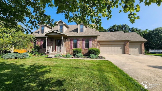 view of front facade with a front lawn and a garage