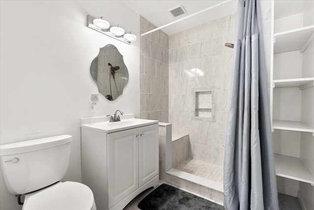 25217 King Rd, Romulus, MI 48174 - full bath with vanity, toilet, and tiled shower