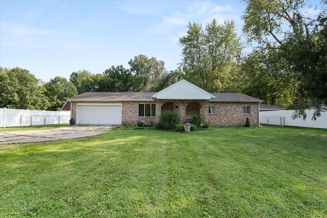 ranch-style home featuring a garage and a front lawn