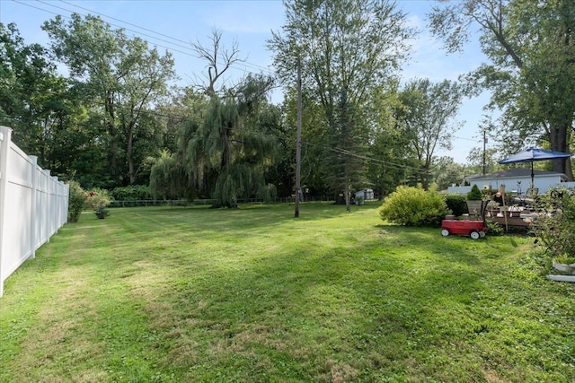 25217 King Rd, Romulus, MI 48174 - view of yard featuring a wooden deck