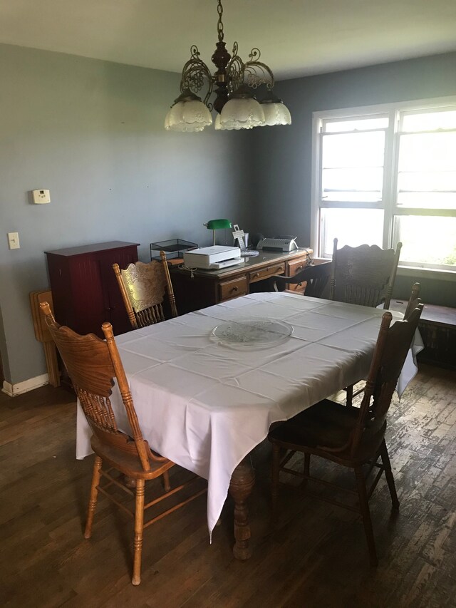 8620 Scio Church Rd, Ann Arbor, MI 48103 - dining area featuring a chandelier, wood finished floors, and plenty of natural light