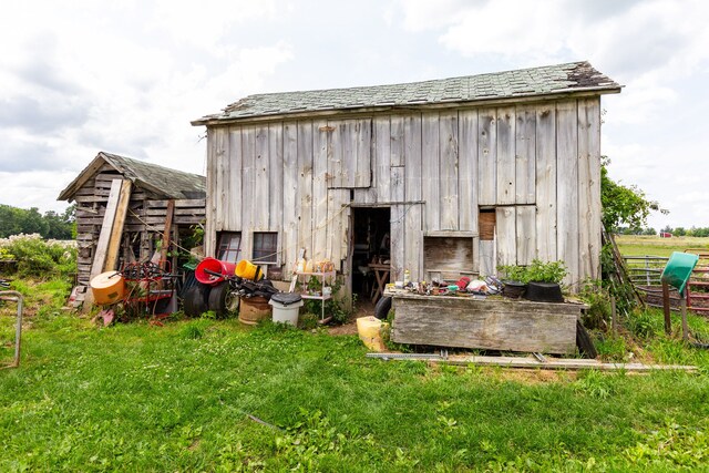 8620 Scio Church Rd, Ann Arbor, MI 48103 - view of barn featuring a lawn