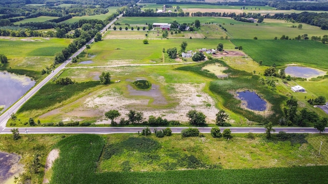8620 Scio Church Rd, Ann Arbor, MI 48103 - aerial overview of property's location with a nearby body of water and rural landscape