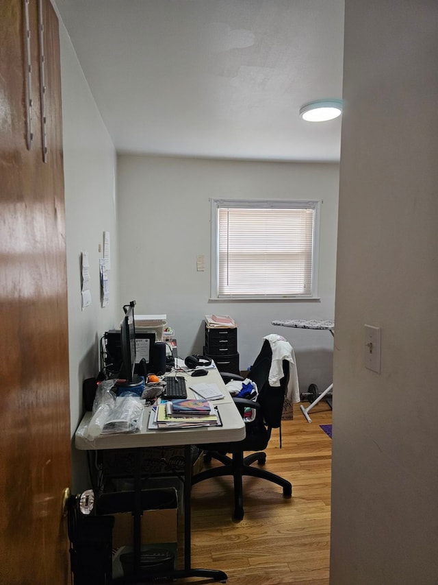 office area with hardwood / wood-style floors