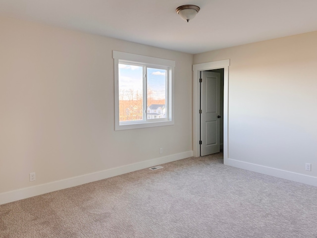 view of carpeted spare room