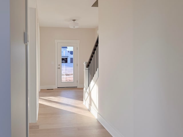 hall featuring light hardwood / wood-style flooring