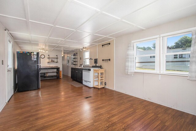 6662 Lorne Dr, Pentwater, MI 49449 - kitchen with freestanding refrigerator, dark wood finished floors, and dishwashing machine