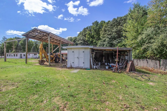 view of outbuilding with a yard