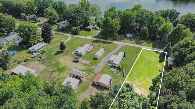 6662 Lorne Dr, Pentwater, MI 49449 - aerial view of property and surrounding area featuring property boundaries highlighted and a nearby body of water