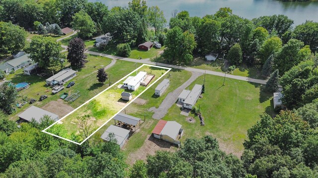 6662 Lorne Dr, Pentwater, MI 49449 - aerial view of property and surrounding area featuring property boundaries highlighted and a nearby body of water