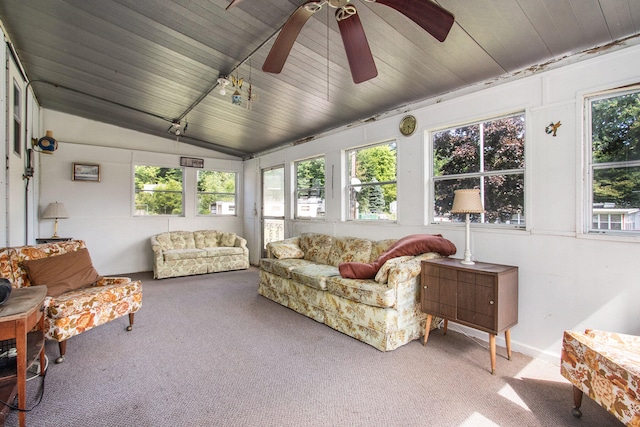 sunroom / solarium featuring wood ceiling and lofted ceiling